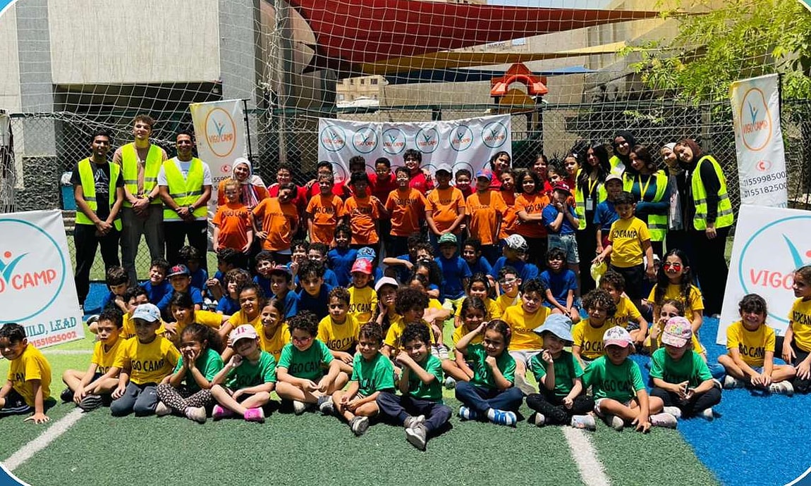 The whole Vigo Camp group together on the field